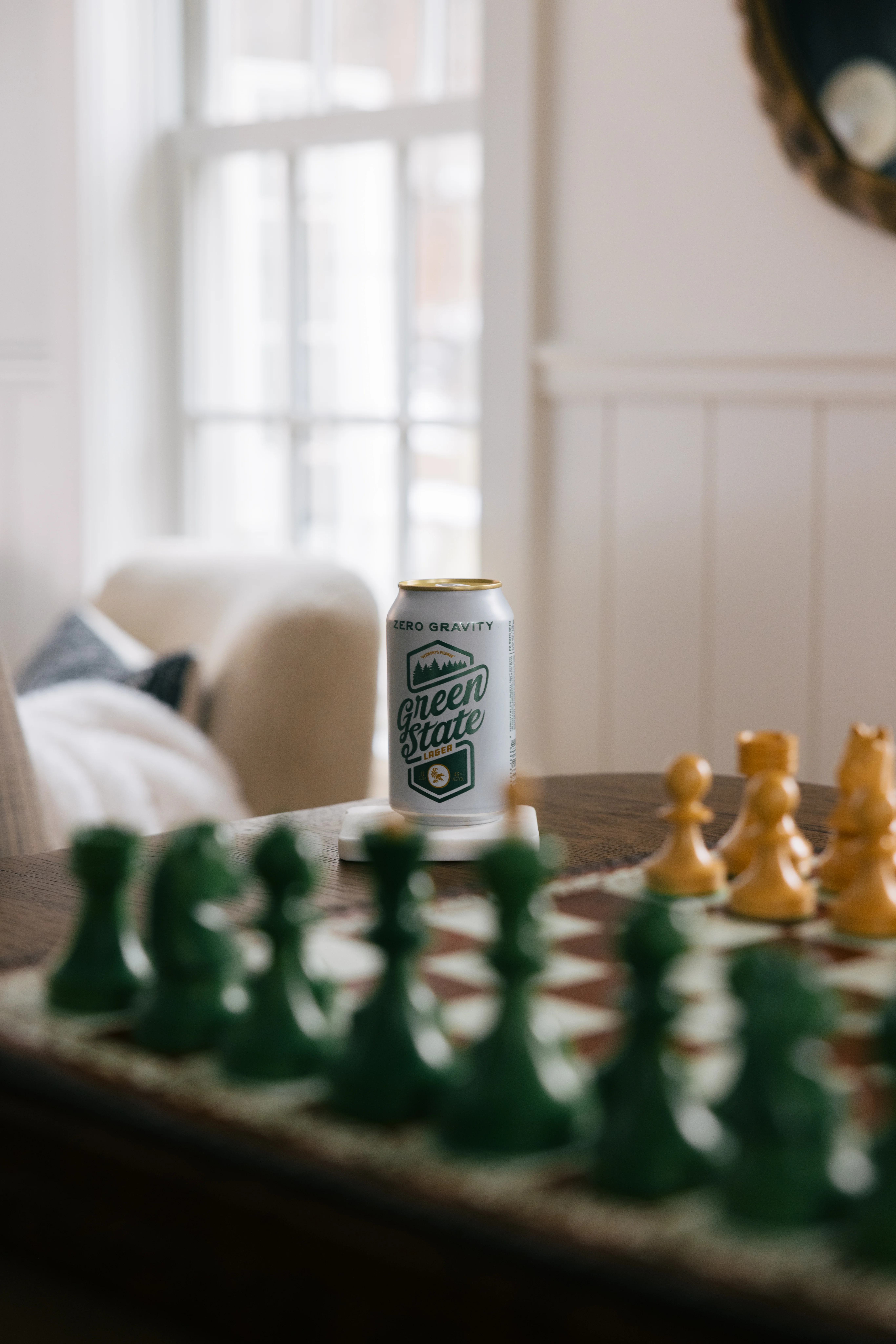 Lifestyle shot of board games being enjoyed in the library lounge area